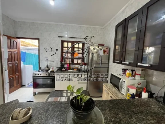 Imagem Casa Térrea à Venda na Aviação Praia Grande - 1 Quarto e Garagem