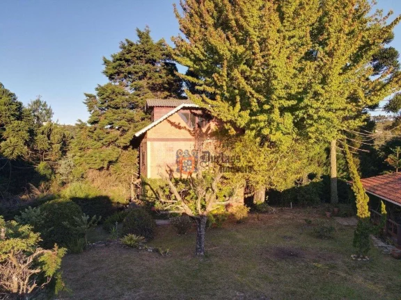 Imagem Casa com 3 dormitórios à venda, 280 m² por R$ 1.220.000 - Alto Do Capivari - Campos do Jordão/SP