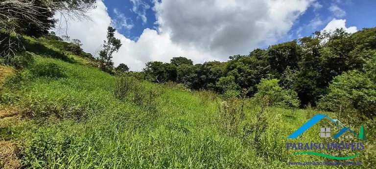 Imagem Paraíso Ecológico: Terreno com Nascente Própria e Vista para as Montanhas.