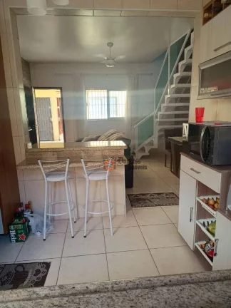 Imagem Sobrado com 2 dormitórios à venda, 79 m² por R$ 318.000 - Oceanópolis - Mongaguá/SP