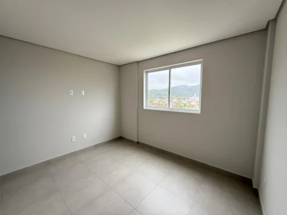 Imagem Apartamento 03 quartos, sendo 01 suíte novo e pronto para morar, na Praia de Gravatáa em Navegantes SC. Adriano Carpes Imóveis Vende