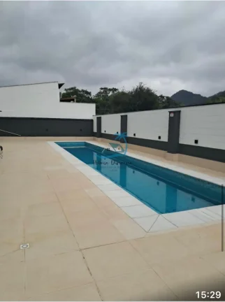 Imagem Apartamento a venda com 2 dormitórios e varanda gourmet no centro de Ubatuba.