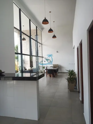 Imagem Casa de alto padrão a venda com 4 dormitórios, 360m² de área construída - Jardim Carolina em Ubatuba.