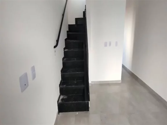 Imagem Sobrado com 2 dormitórios à venda, 77 m² por R$ 350.000,00 - Caiçara - Praia Grande/SP