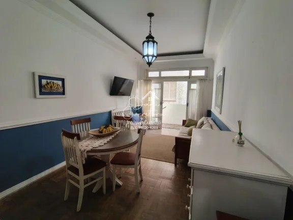 Imagem Apartamento frente mar com linda vista lateral de 2 Quartos em Pitangueiras, Guarujá-SP: 2 Salas, 2 Banheiros, 1 Vaga de Garagem, 75m².