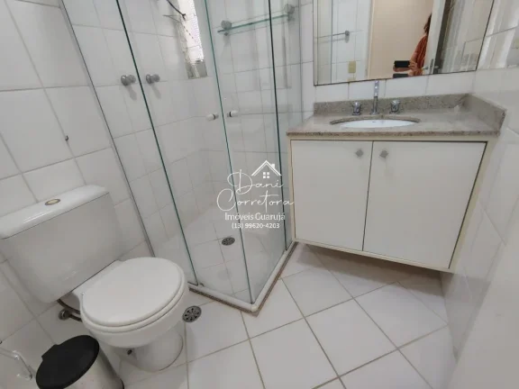 Imagem Apartamento à venda no Jardim Astúrias, Guarujá-SP: 3 quartos, 1 suíte, 2 salas, 2 banheiros, 2 vagas de garagem, 110m².