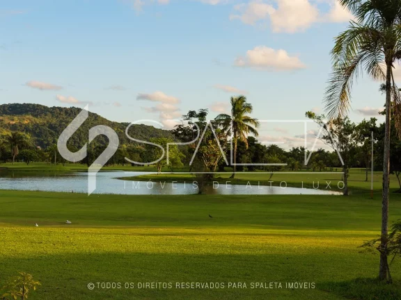 Imagem Lindíssima residência com golfe no quintal e vista sensacional para o lago à venda no Guarujá Golf Club
