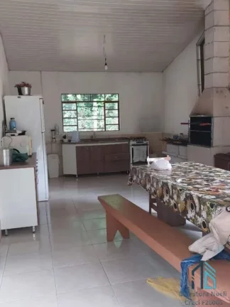 Imagem Chácara contendo tanque de peixes, 02 casas, internet, em condomínio - Morretes PR