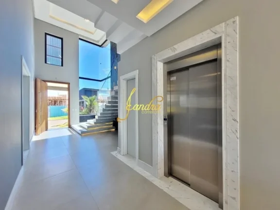 Imagem Sobrado beira de lago com 05 suítes, elevador, semi mobiliado