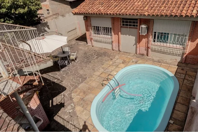 Imagem Casa com 4 Quartos à Venda,  em Camaquã - Porto Alegre
