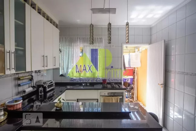 Imagem Casa em Condomínio de Alto Padrão na Vila Esperança, São Paulo-SP: 3 Quartos, 1 Suíte, 2 Vagas - 99m² de Luxo!