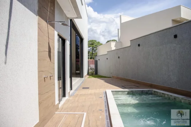 Imagem Casa em Condomínio para Venda em Senador Canedo, Jardins Bolonha, 4 dormitórios, 4 suítes, 5 banheiros, 4 vagas