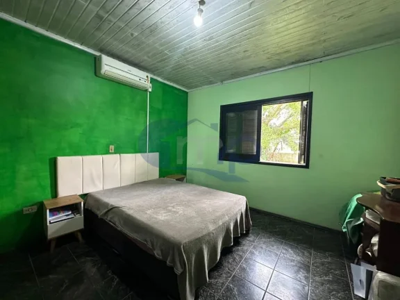 Imagem Casa á venda com 4 dormitórios no Igra Sul em Torres/RS