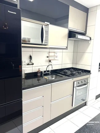 Imagem Semi mobiliado- Apto de 66m2 - 2 Dorm sendo uma suíte,varanda, 2 vagas de carro