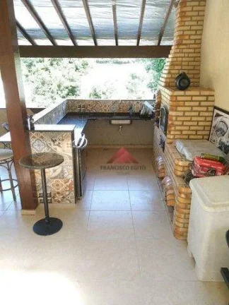Imagem Casa com 4 quartos (1 suíte) à venda, 390 m²