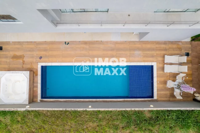 Imagem Luxuosa Casa no Cond. Quintas do Sol com 4 Suítes e 430m²