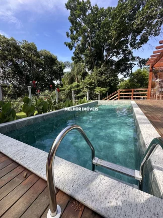 Imagem Casa de Alvenaria nova com 3 suítes localizada na Praia de Taquaras em Balneário Camboriú - SC