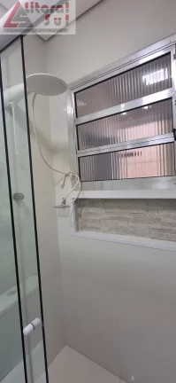 Imagem Casa à venda em Praia Grande-SP, bairro Vilamar, 2 quartos, 1 suíte, 1 sala, 2 banheiros, 95m². Confira já!