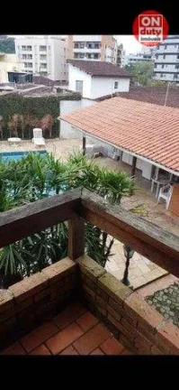 Imagem Triplex com 3 dormitórios à venda, 112 m² por R$ 440.000 - Jardim Três Marias - Guarujá/SP