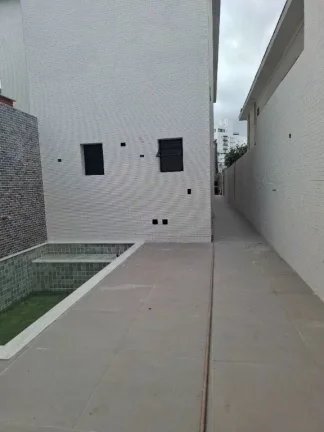 Imagem Casa com 3 dormitórios à venda, 140 m² por R$ 1.300.000,00 - Embaré - Santos/SP