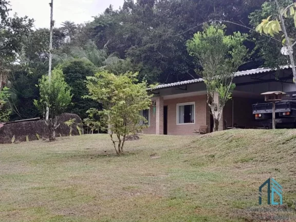 Imagem Chácara contendo tanque de peixes, 02 casas, internet, em condomínio - Morretes PR