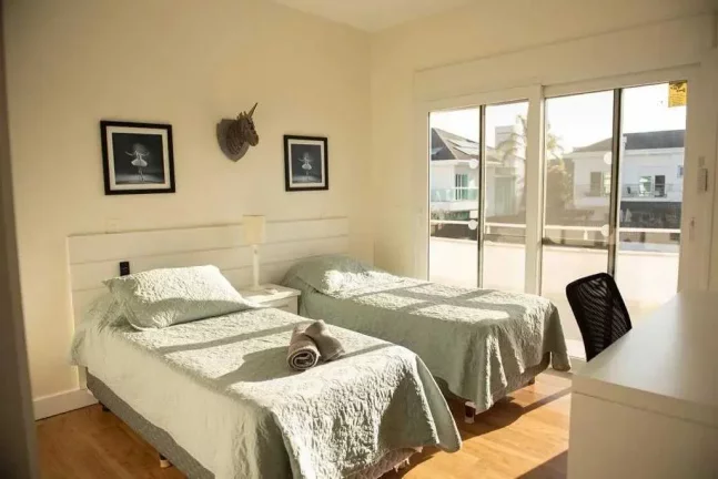 Imagem Casa com 5 dormitórios sendo 4 suítes e 6 vagas de garagem em Jurerê Internaciona l Florianópolis/SC