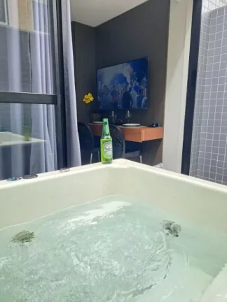 Imagem Flat Moderno com Jacuzzi Privativa – Sofisticação e Conforto em Jardim Oceania