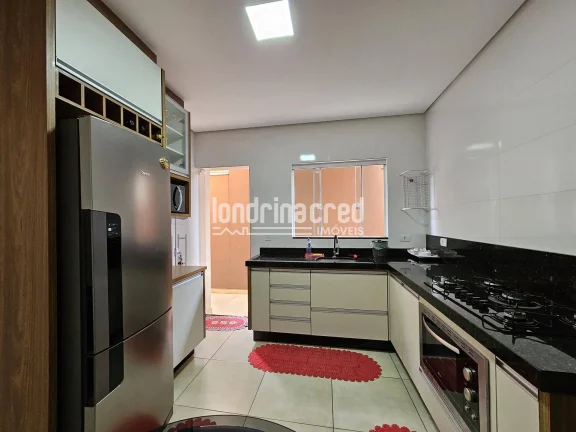 Imagem Casa à venda no Jardim São Paulo 2 – 2 quartos, cozinha planejada, área gourmet com churrasqueira e garagem coberta. Conforto e praticidade em Londrina!