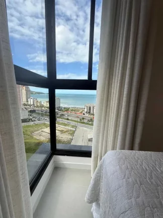 Imagem Apartamento vista mar com 2 suítes e 1 vaga de garagem em Itapema/SC