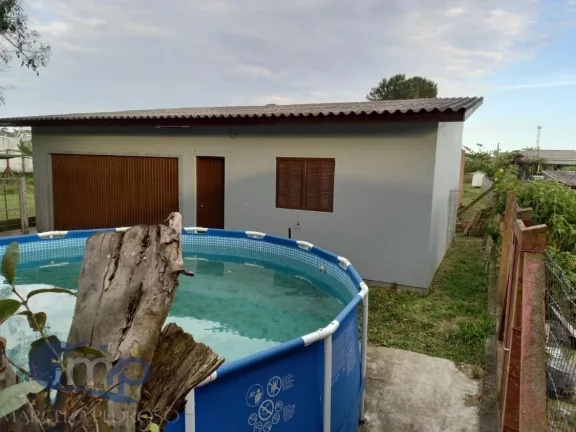 Imagem Casa à venda com 3 dormitórios na Itapeva Sul em Torres/RS