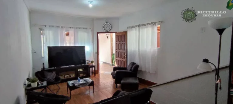 Imagem Sobrado com 3 dormitórios à venda, 118 m² por R$ 680.000,00 - Canto do Forte - Praia Grande/SP