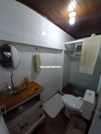 Imagem Casa de Alvenaria com 4 Dormitórios sendo 3 suítes localizado em Banheiros em Camboriú