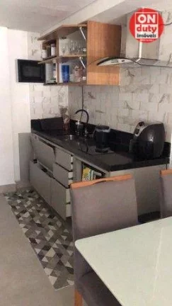 Imagem Sobrado com 3 dormitórios à venda, 150 m² por R$ 1.100.000,00 - Cidade Jardim Tom - Guarujá/SP