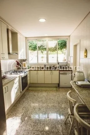 Imagem Casa de condomínio com 498 m² e 6 quartos