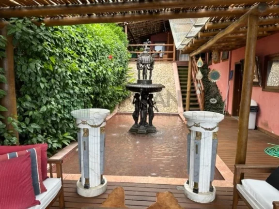 Imagem Deslumbre-se com esta incrível oportunidade de adquirir uma casa dos sonhos no exclusivo condomínio Yacamim, localizado em Ilhabela. Com uma vista esp