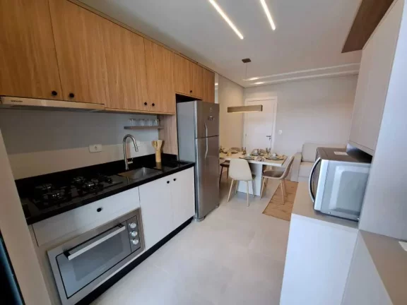 Imagem Apartamento com 2 dormitórios sendo 1 suíte e 1 vaga de garagem em Guaratuba