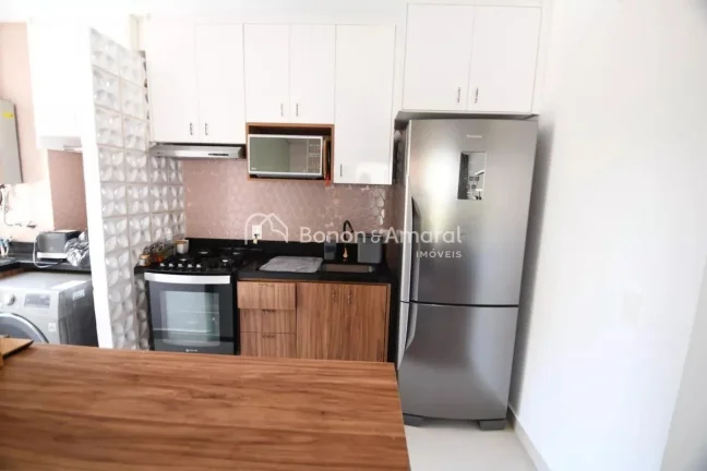 Imagem Localizado no charmoso bairro do Taquaral, este apartamento oferece uma combinação perfeita de con...