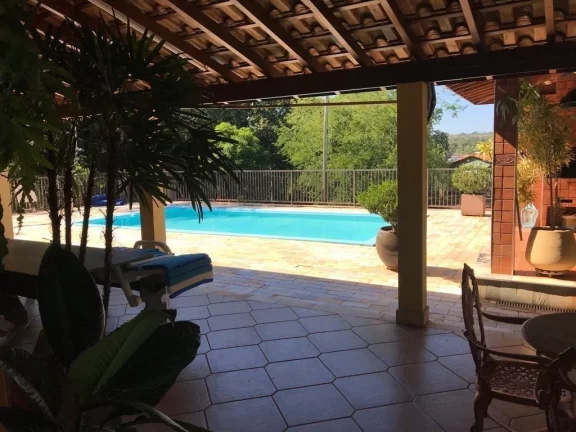 Imagem EXCELENTE RANCHO COMPLETO COM ACESSO Á ÁGUA EM ESTREITO COM ASFALTO ATÉ Á PORTA - 04 dormitórios sendo 03 suítes - Varanda contornando toda á casa