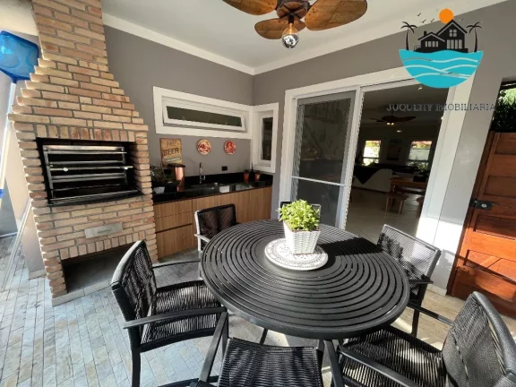 Imagem Casa de Temporada em Juquehy - Casa em condomínio, 3 suítes, 600metros da praia, 2 vagas, piscina privativa max. 8 pessoas | Juquehy Imobiliária