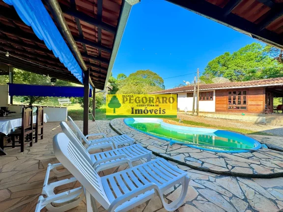 Imagem Magnífico Sítio de 3 Hectares com Cachoeira Privativa em Paraibuna-SP: 6 quartos, 1 suíte, 7 salas, 6 banheiros, 20 vagas de garagem.