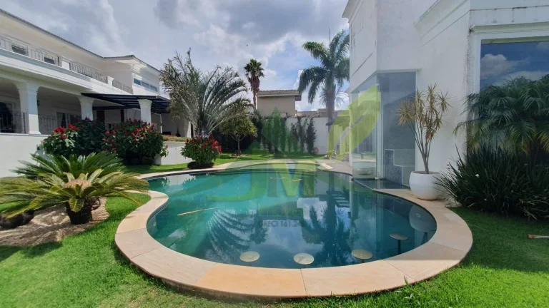 Imagem Mansão de Luxo no Condomínio Flamboyant: Exclusividade e Sofisticação em At