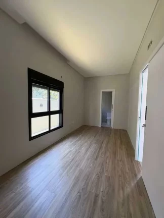 Imagem Casa alto padrão em condomínio com 4 suítes e 4 vagas de garagem em Camboriú/SC