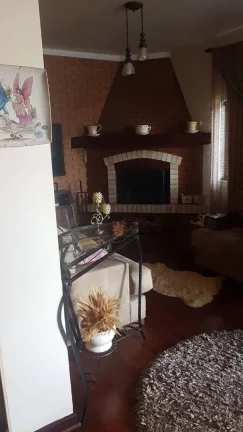 Imagem Sobrado com 3 dormitórios à venda, 206 m² por R$ 1.150.000 - J Jaguaribe - Campos do Jordão/SP