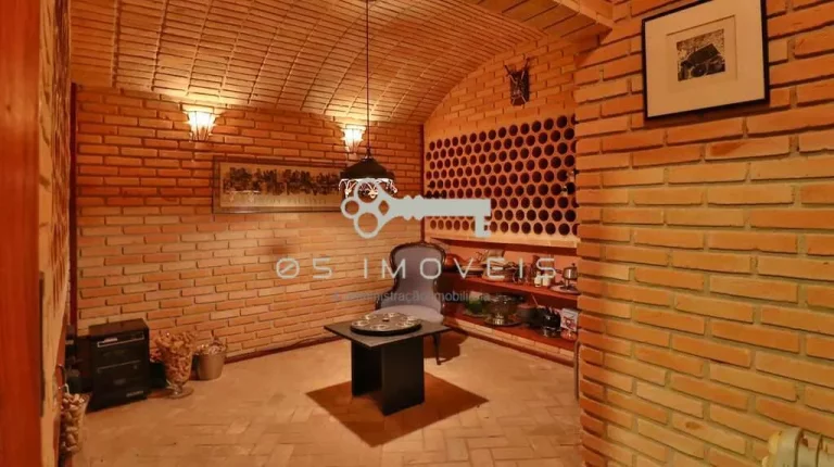 Imagem Casa alto padrão à venda na Aldeia da Serra com 7 suítes e espaço gourmet