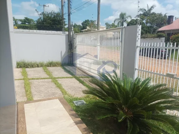 Imagem Casa de alto padrão á venda com 4 suites no bairro Centenário em Torres/RS