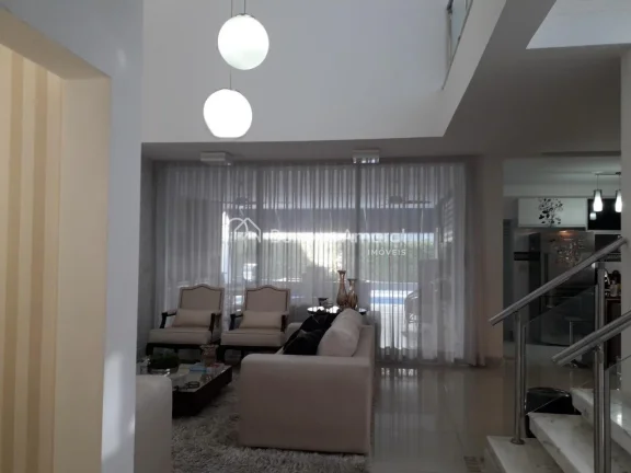 Imagem Se você busca um lar sofisticado e repleto de conforto, esta residência no Condomínio Terras do C...