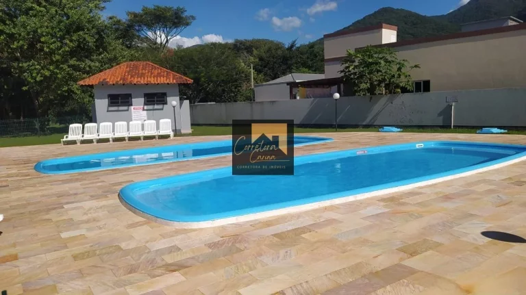 Imagem Terreno plano de 300 m² em condomínio fechado! Localizado na Praia de Fora a 600 metros da Praia! ...
