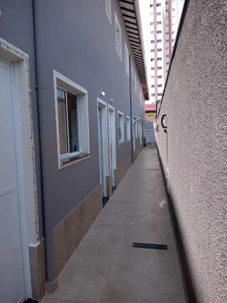 Imagem Sobrado de 2 quartos em condomínio para venda na Aviação, Praia Grande-SP: 1 banheiro, 1 vaga, 50,00 m².