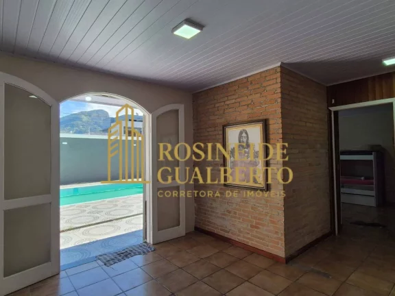 Imagem Casa 3 Dormitórios à venda no bairro Indaiá, Bairro nobre de Caraguatatuba