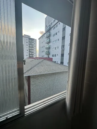 Imagem Apartamento à venda na Guilhermina, Praia Grande-SP: 1 quarto, 1 sala, 1 banheiro, 1 vaga de garagem, 36m² de área. Venha conferir!